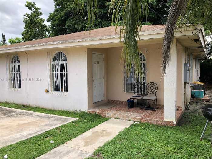 photo 1: 1711 NW 65th St, Miami FL 33147