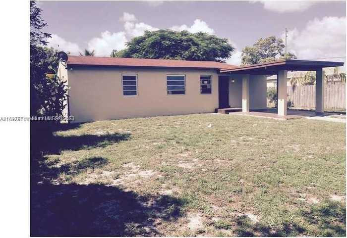 photo 2: 1680 NW 129th St, North Miami FL 33167