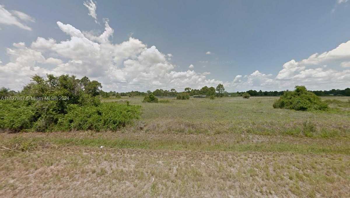 photo 1: 730 N OLIVO ST, Clewiston FL 33440