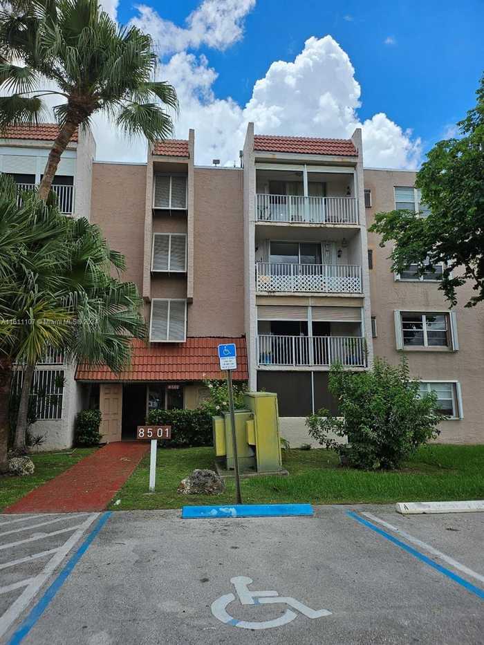 photo 1: 8501 NW 8th St Unit 102, Miami FL 33126