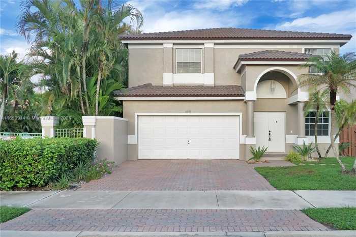 photo 1: 2091 NW 98th Way, Pembroke Pines FL 33024