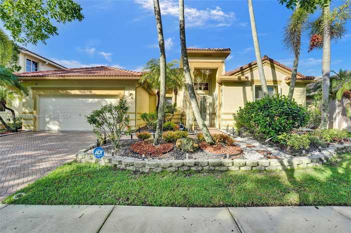 photo 1: 1177 Skylark Dr, Weston FL 33327