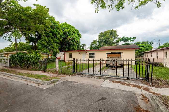 photo 1: 1610 NW 120th St, North Miami FL 33167