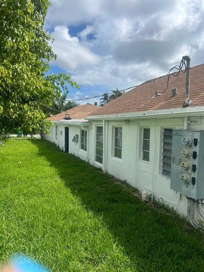 photo 1: 1326 NE 110th St, Miami FL 33161