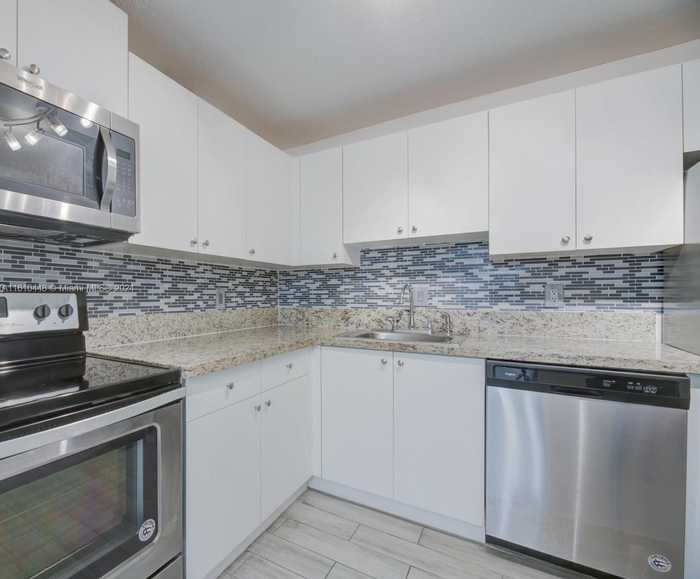 photo 2: 5102 NW 79th Ave Unit 103, Doral FL 33166