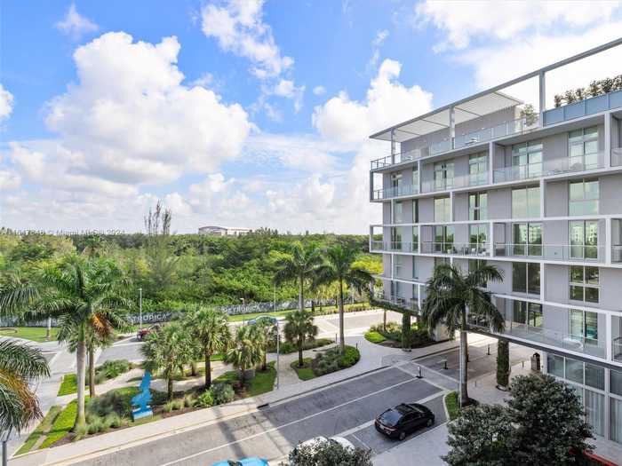 photo 1: 2000 Metropica Way Unit 502, Sunrise FL 33323