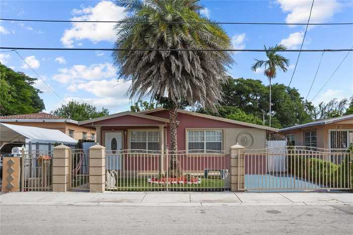 photo 1: 1122 NW 59th St, Miami FL 33127