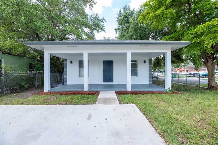 photo 1: 1776 NW 78th St, Miami FL 33147