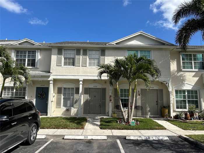 photo 1: 4990 SW 31st Ter Unit 390, Dania Beach FL 33312