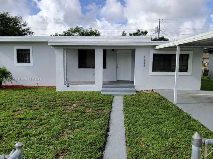 photo 1: 1944 NW 83rd Ter, Miami FL 33147