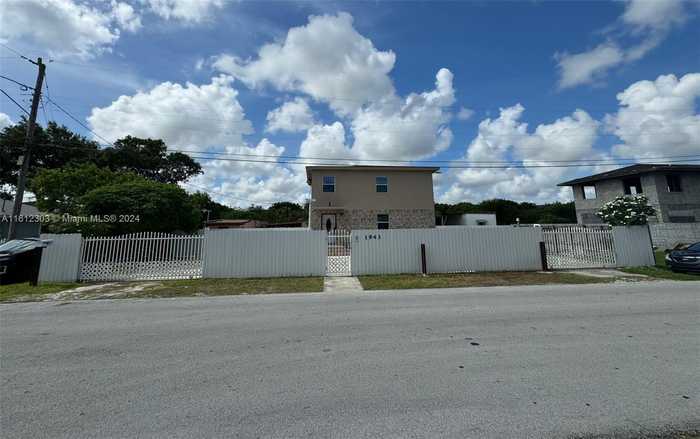 photo 1: 1943 NW 72nd St, Miami FL 33147