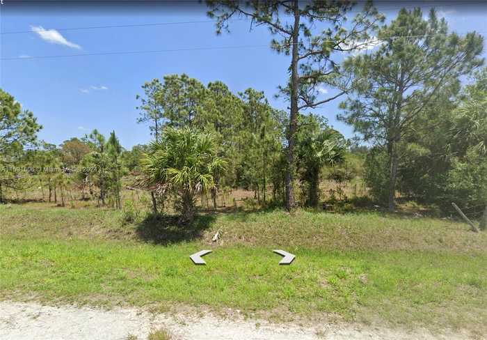 photo 1: 325 N Sendero St, Clewiston FL 33440