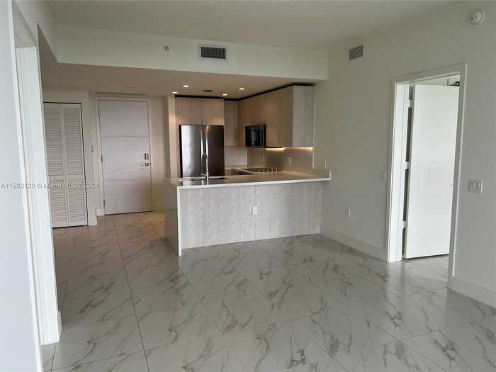 photo 2: 2000 Metropica Way Unit 1911, Sunrise FL 33323