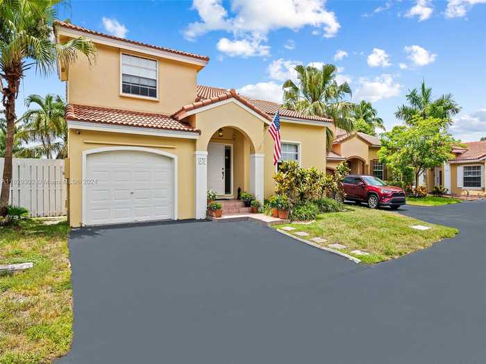 photo 1: 1232 NW 125th Ter, Sunrise FL 33323