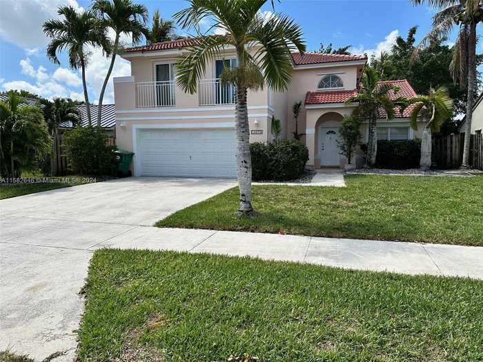 photo 1: 15970 SW 72nd Ter, Miami FL 33193