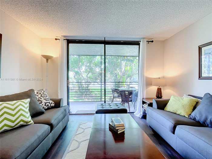 photo 2: 1000 Colony Point Cir Unit 205, Pembroke Pines FL 33026