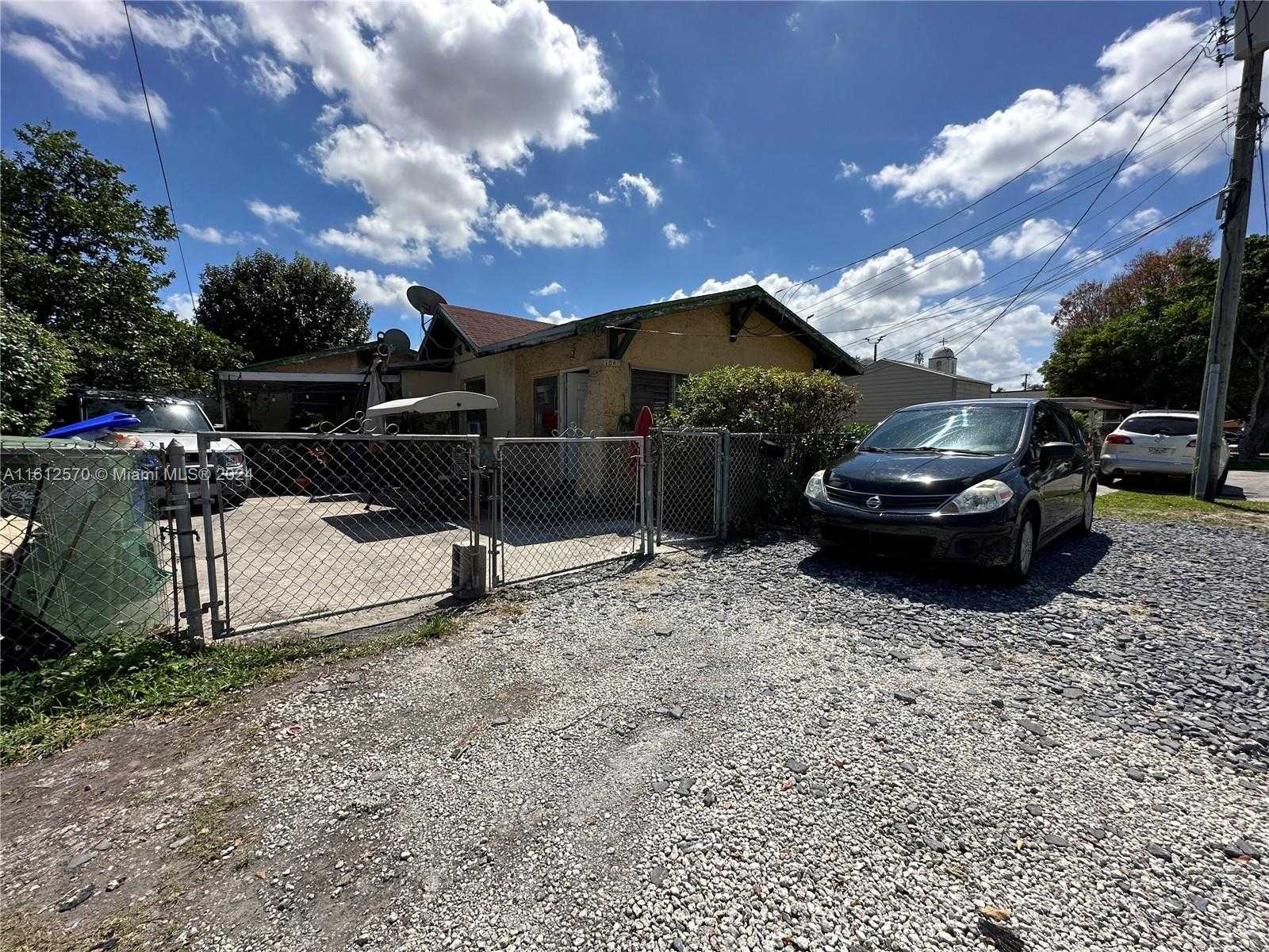 photo 1: 1842 NW 18th Ter, Miami FL 33125