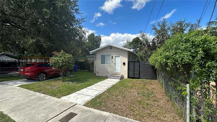 photo 1: 135 NW 68th St, Miami FL 33150