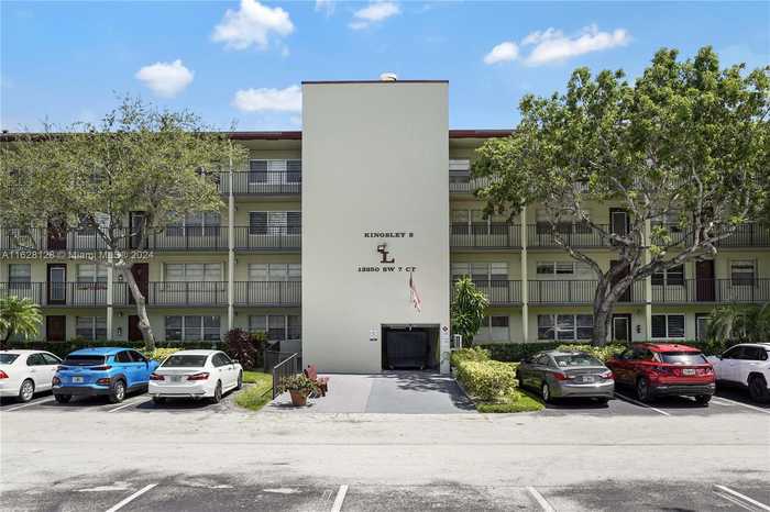 photo 1: 13250 SW 7th Ct Unit 110L, Pembroke Pines FL 33027