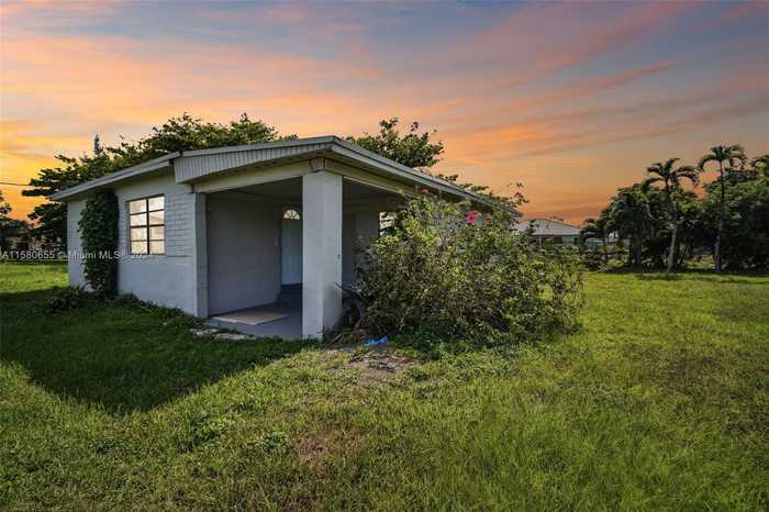 photo 1: 11400 NW 22nd Ave, Miami FL 33167