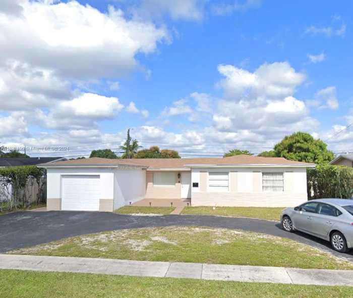 photo 1: 4221 NW 23rd St, Lauderhill FL 33313