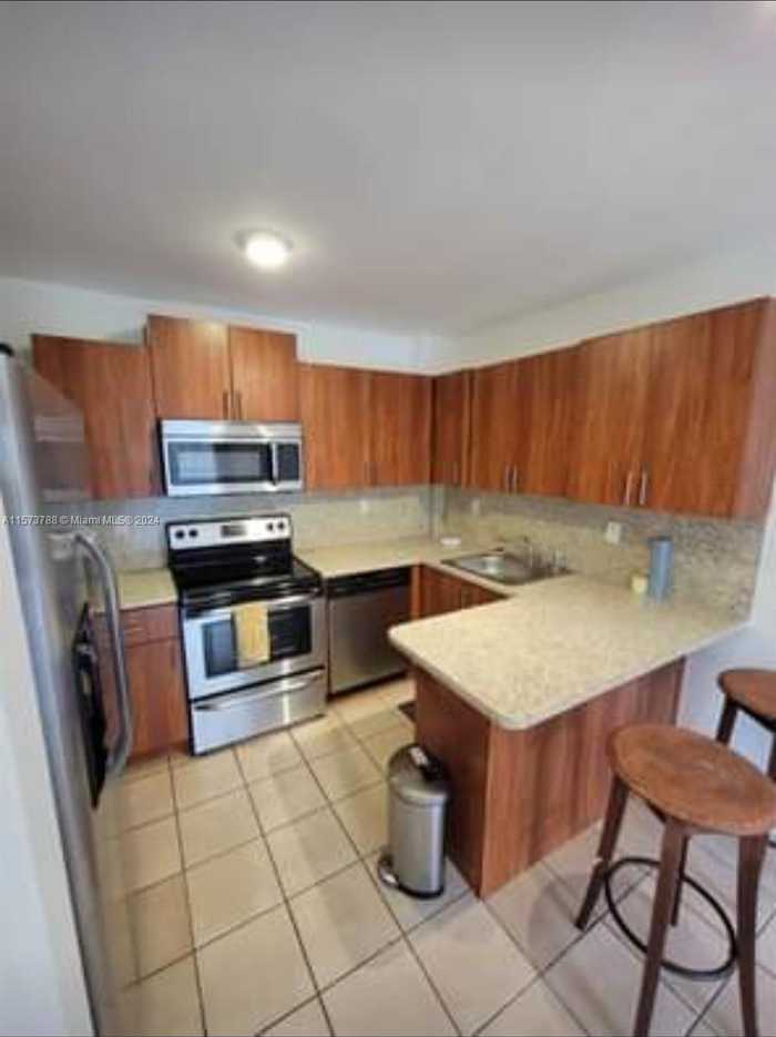 photo 1: 1933 SW 7th St Unit 102, Miami FL 33135