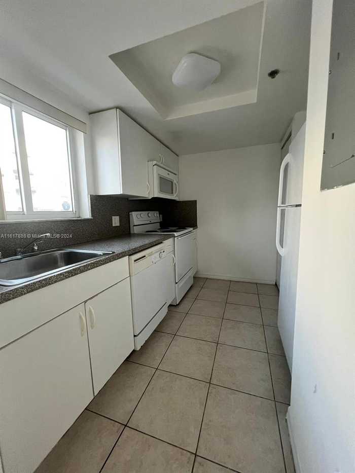 photo 1: 2475 NW 16th St Rd Unit 308, Miami FL 33125