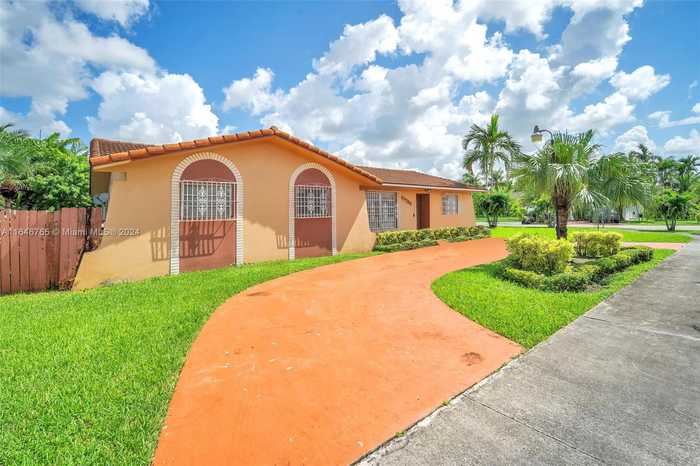 photo 1: 10785 SW 26th St, Miami FL 33165