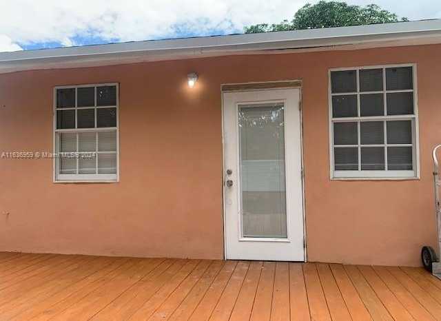 photo 1: 1434 NW 116th St, Miami FL 33167