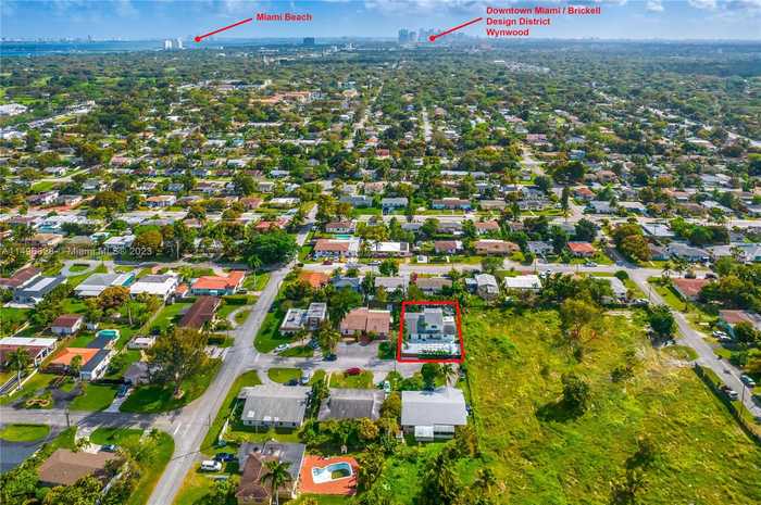 photo 1: 370 NE 113th St, Miami FL 33161