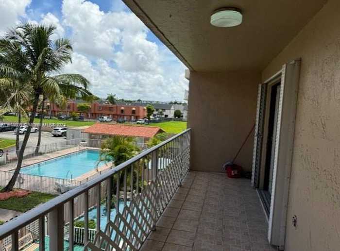 photo 1: 8517 NW 7th St Unit 304, Miami FL 33126