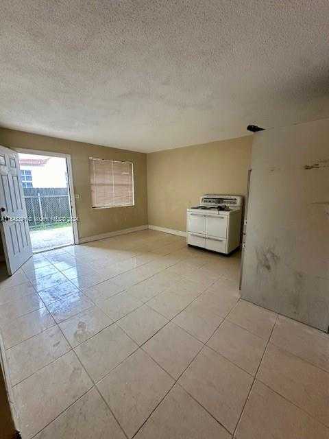 photo 3: 3135 NW 28th St, Miami FL 33142