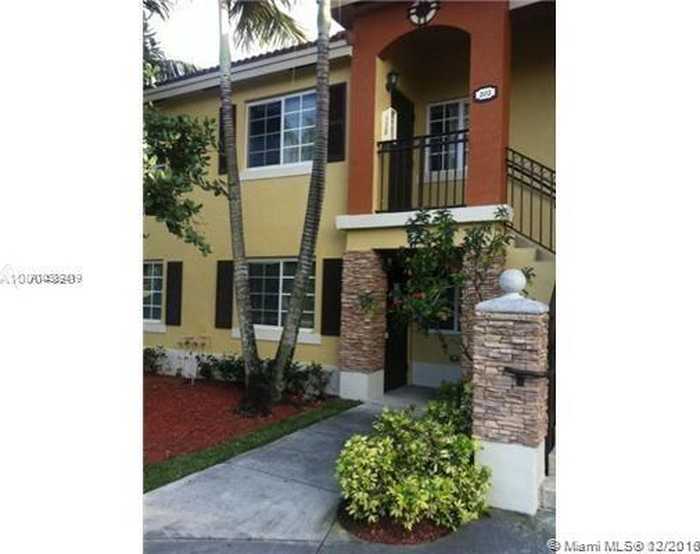 photo 1: 3398 NE 9th Dr Unit 102, Homestead FL 33033