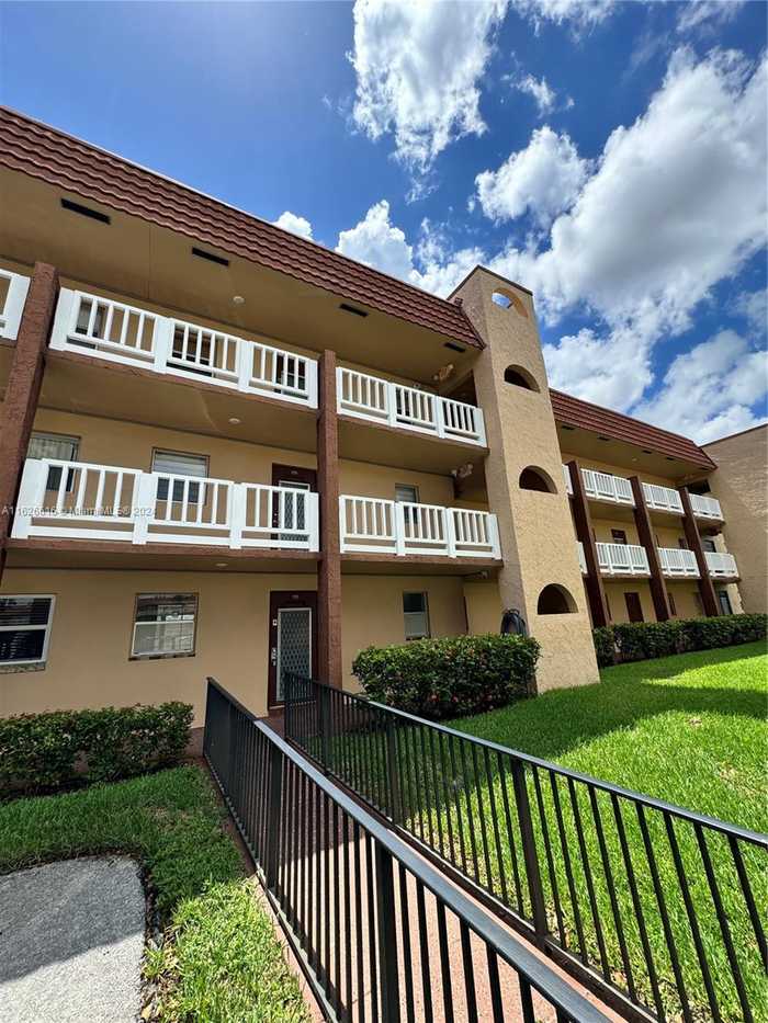 photo 1: 9041 Sunrise Lakes Blvd Unit 110, Sunrise FL 33322