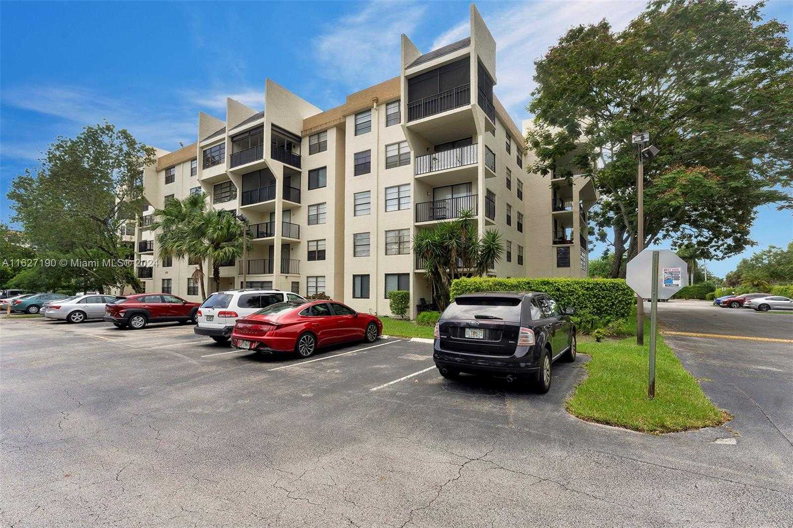 photo 1: 6190 Woodlands Blvd Unit 108, Tamarac FL 33319