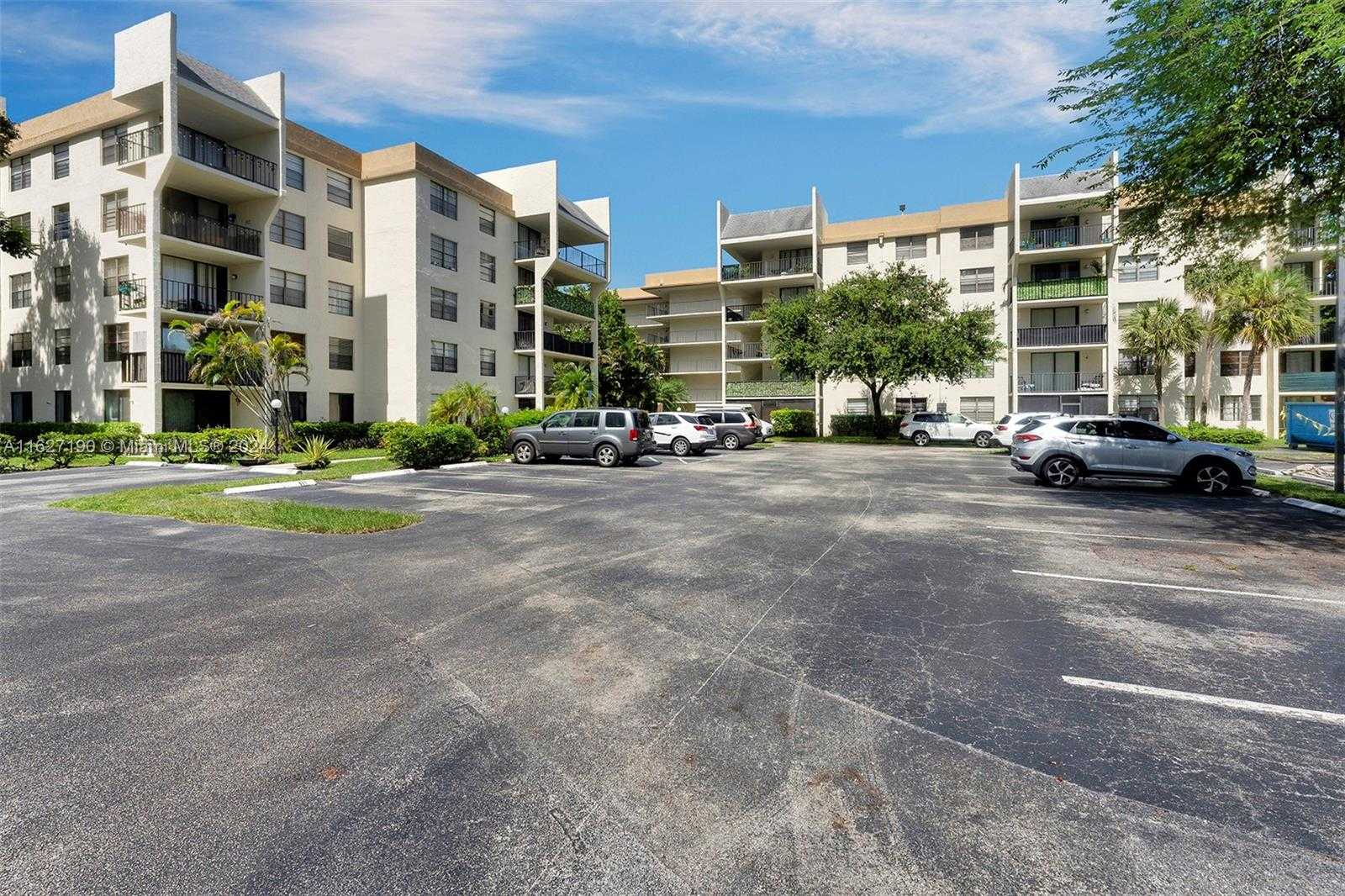 photo 2: 6190 Woodlands Blvd Unit 108, Tamarac FL 33319