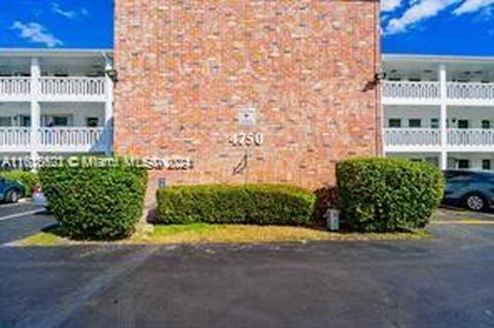 photo 1: 4750 NW 10th Ct Unit 308, Plantation FL 33313