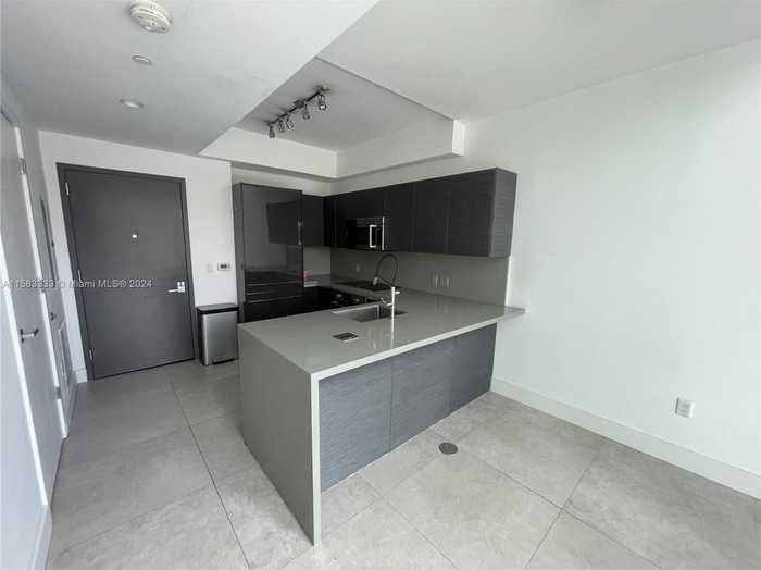 photo 2: 1080 Brickell Ave Unit 311, Miami FL 33131