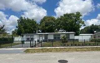 photo 1: 3561 NW 3rd St, Lauderhill FL 33311