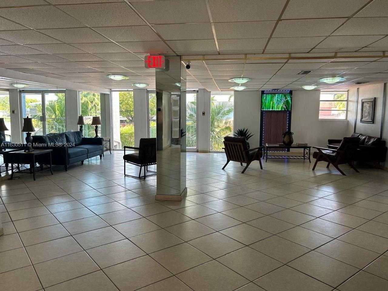 photo 2: 5050 NW 7th St Unit 410, Miami FL 33126