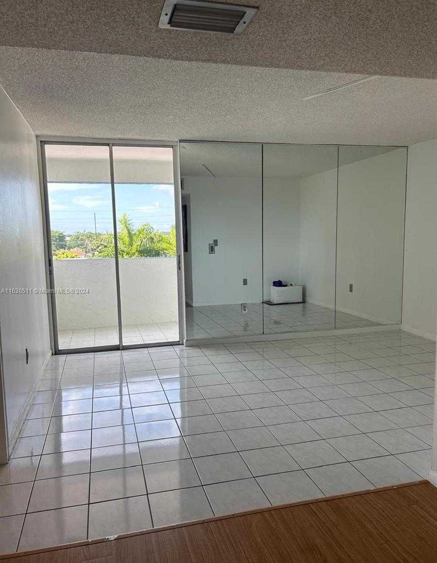 photo 3: 5050 NW 7th St Unit 410, Miami FL 33126