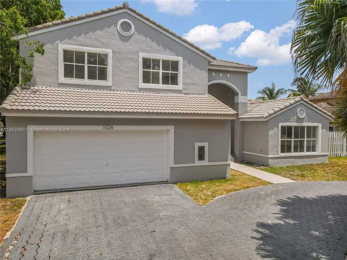 photo 1: 1026 NW 132nd Ave, Sunrise FL 33323