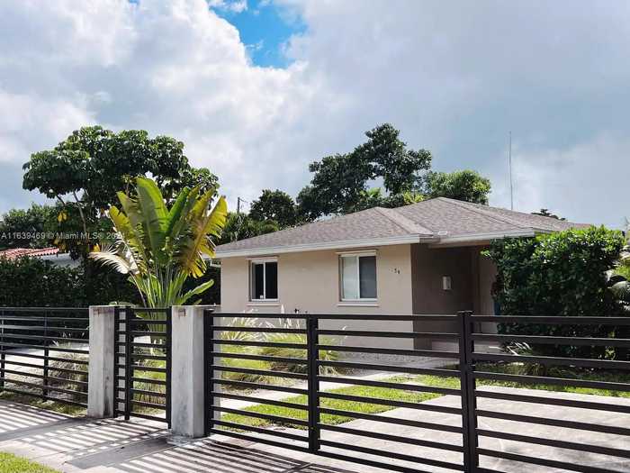 photo 1: 54 NW 84th St, Miami FL 33150