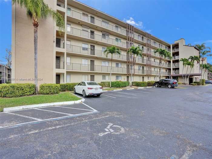 photo 1: 7740 NW 50th St Unit 210, Lauderhill FL 33351