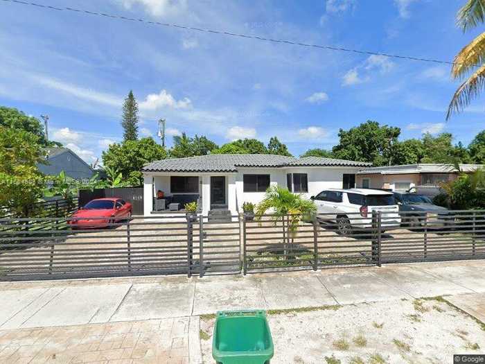 photo 1: 1275 NW 117th St, Miami FL 33167