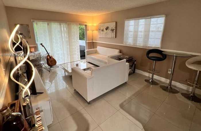 photo 1: 1221 SW 122nd Ave Unit 214, Miami FL 33184