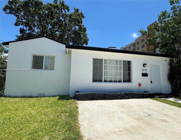 photo 1: 1610 NW 53rd St, Miami FL 33142