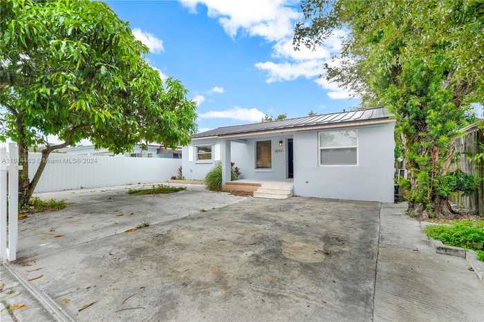 photo 1: 3010 NW 95th Ter, Miami FL 33147