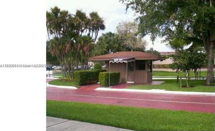 photo 2: 1001 Colony Point Cir Unit 118, Pembroke Pines FL 33026