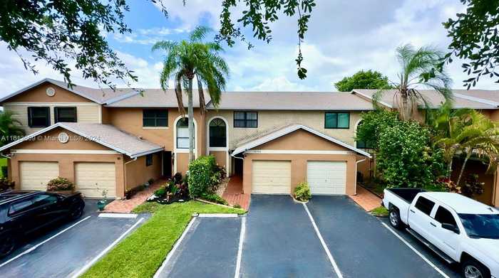 photo 1: 10584 NW 6th St Unit 10584, Pembroke Pines FL 33026